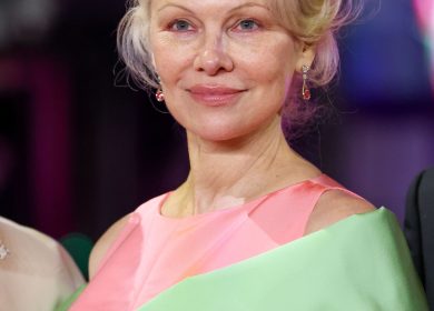 Pamela Anderson's Feathery Layers Are a Trip to the '70s—See the Photos
